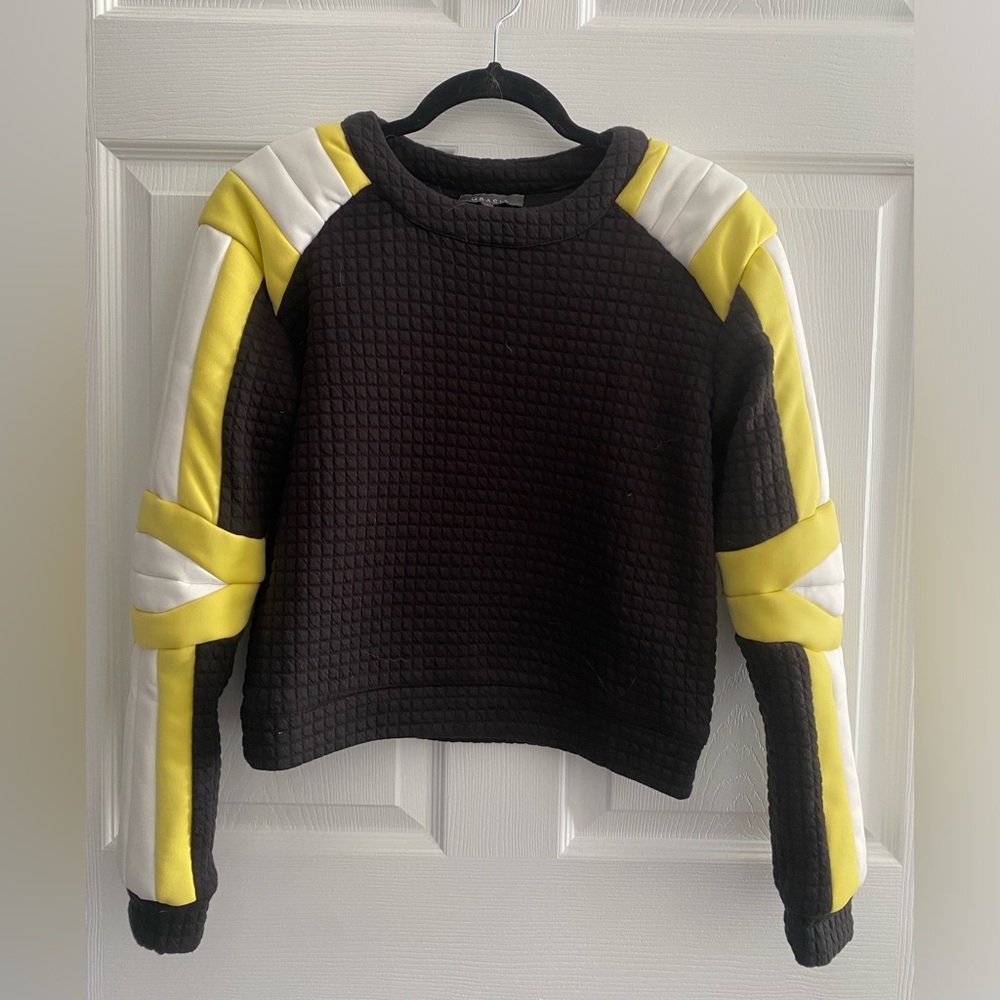Gracia- black sweater with cool yellow detailing on the sides